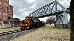 WE 7011 comes north under the A&BB RR bridge that has been silent for some 30 years.